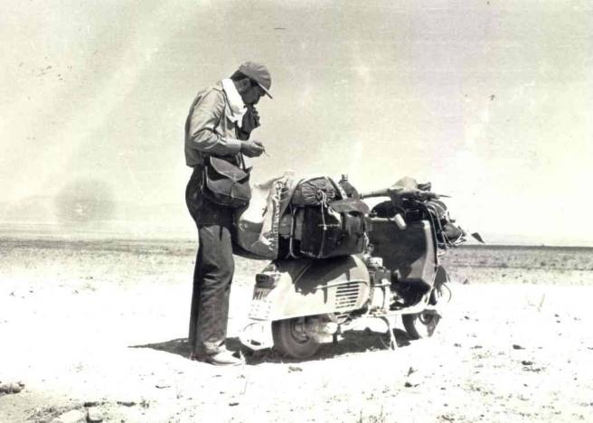 Roberto Patrignani photographed in Afghanistan on his way to Tokyo from Italy on a 1964 Vespa adapted to the purpose.