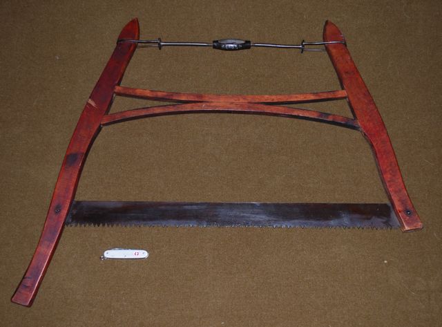 Firewood bucksaw, the grandfather of the family.