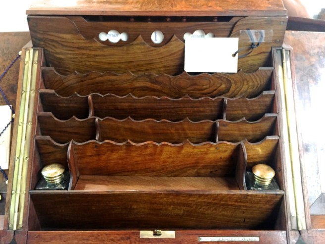 An interior view showing storage and the perpetual calendar.